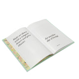 Open "Every Day is a Gift" special edition book on a while background.
